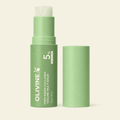 Olivine PDRN Green Collagen Volume Multi Balm open stick with cap on cream background