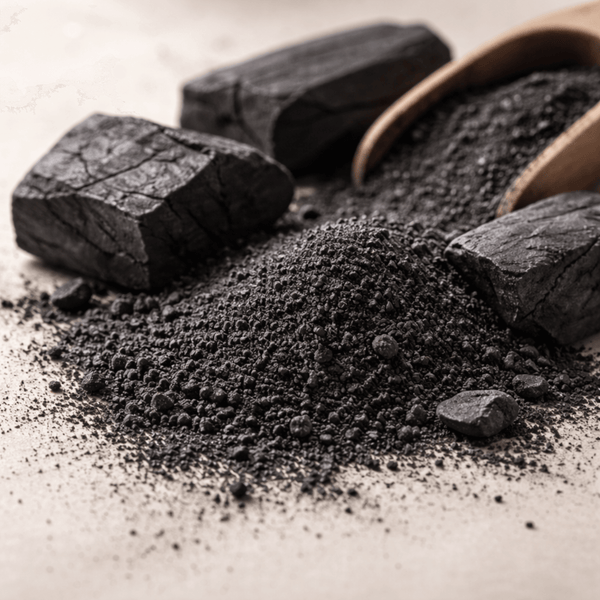 Activated charcoal ingredient used in clay mask for absorbing oil and refining pore appearance