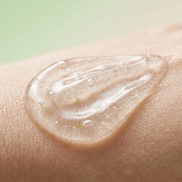 Aloe vera gel soothing skin with a smooth and calming texture