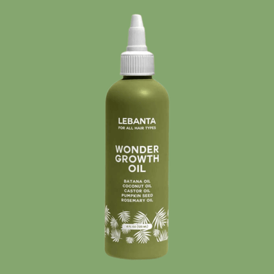Batana hair growth oil bottle isolated on clean background with clear label