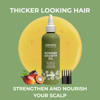 Batana hair growth oil bottle with applicator and natural ingredients for scalp nourishment