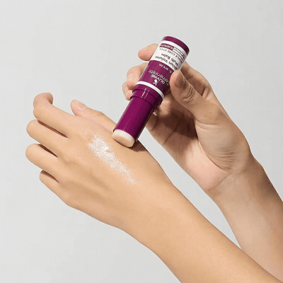 Olivine Beauty calcium volume multi balm texture applied on skin showing smooth hydrating finish.