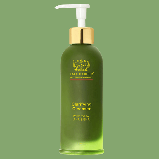 Olivine Beauty clarifying cleanser bottle close up with AHA and BHA formula