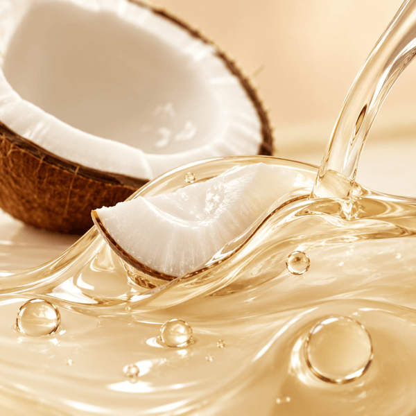 Olivine Beauty coconut oil visualization representing nourished lips and long-lasting moisture support.