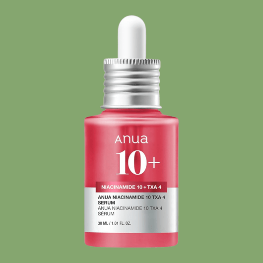 Olivine Beauty dark spot correcting serum bottle with niacinamide and tranexamic acid formula.