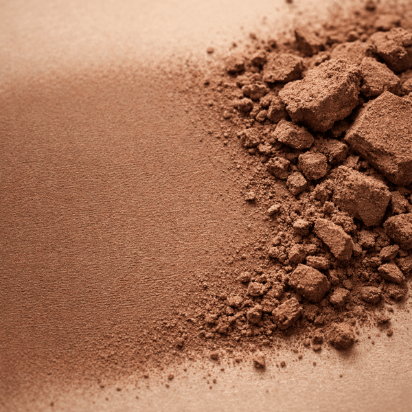 Olivine Beauty contour powder texture showing sculpting cosmetic ingredient for facial definition