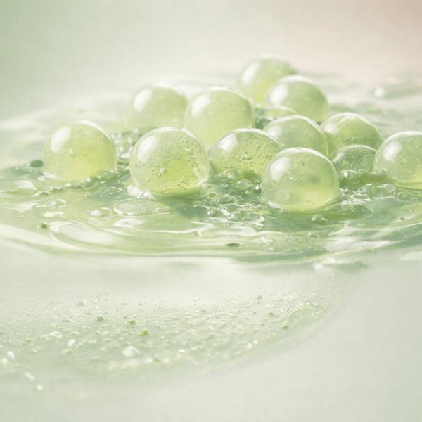 Matcha scrub pearls gently exfoliating to remove buildup and refine skin texture