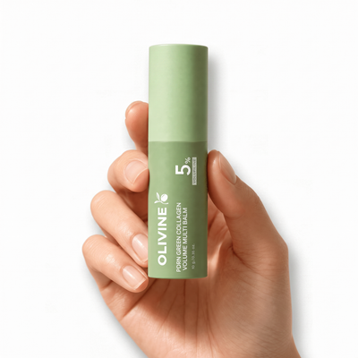 Hand holding the Olivine Beauty PDRN Green Collagen Volume Multi Balm stick to show its size