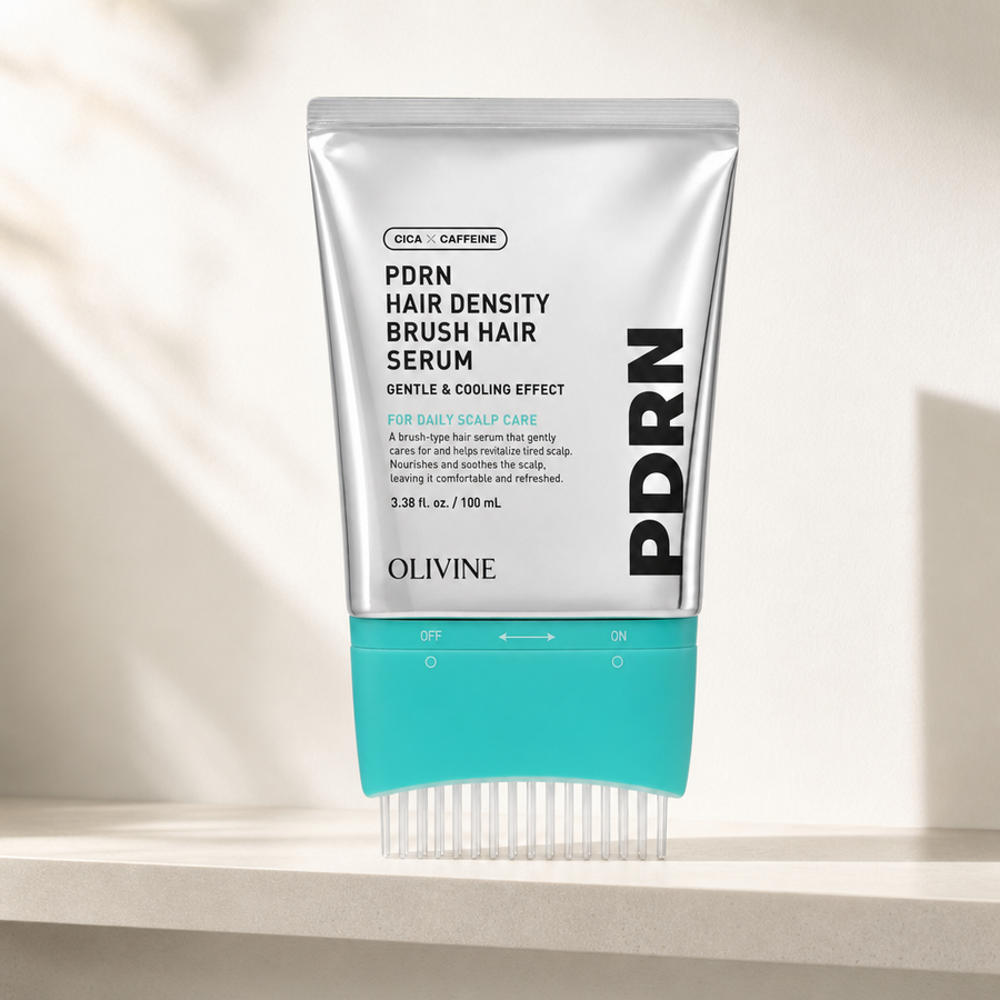 PDRN Hair Density Brush Serum standing on a bathroom shelf