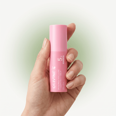 Hand holding the Olivine Beauty PDRN Pink Collagen Volume Multi Balm stick to show its size