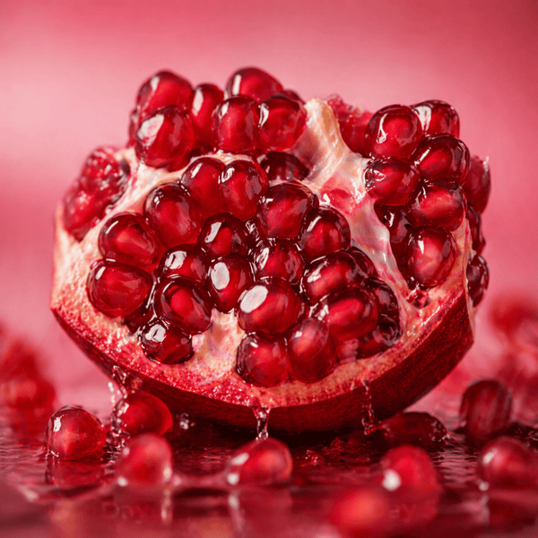 Pomegranate enzymes for brightening and refreshing skin appearance