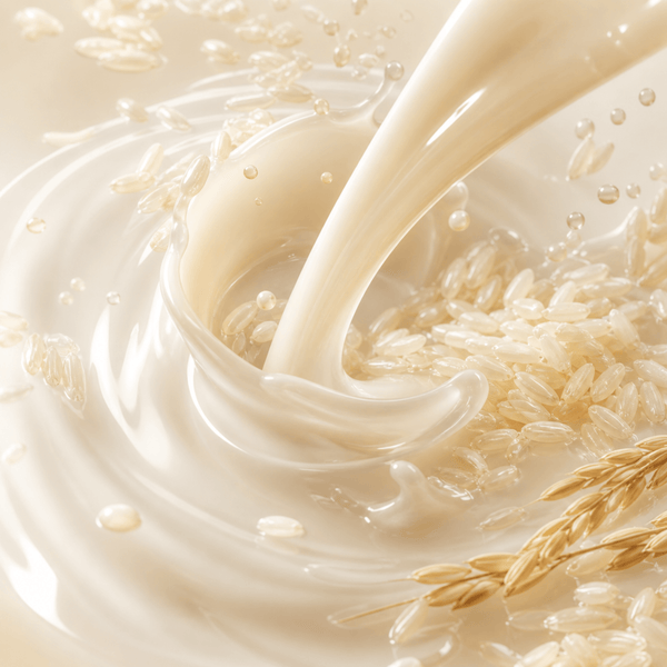 Creamy rice extract textures with glossy hydration flow and soft radiance aesthetic