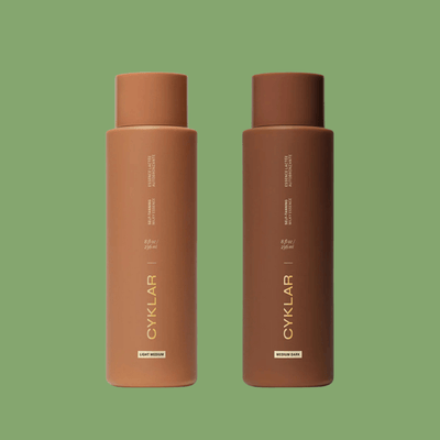 CYKLAR Self Tanning Milky Essence bottles in Light Medium and Medium Dark variants on sage green background