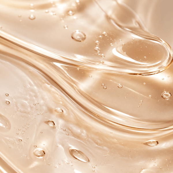 Lightweight squalane inspired skincare essence with silky hydration textures and luminous skin glow