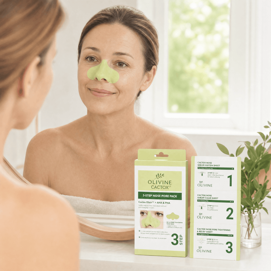 Olivine Cactox 3 Step Nose Mask Pack held by a woman with glowing skin