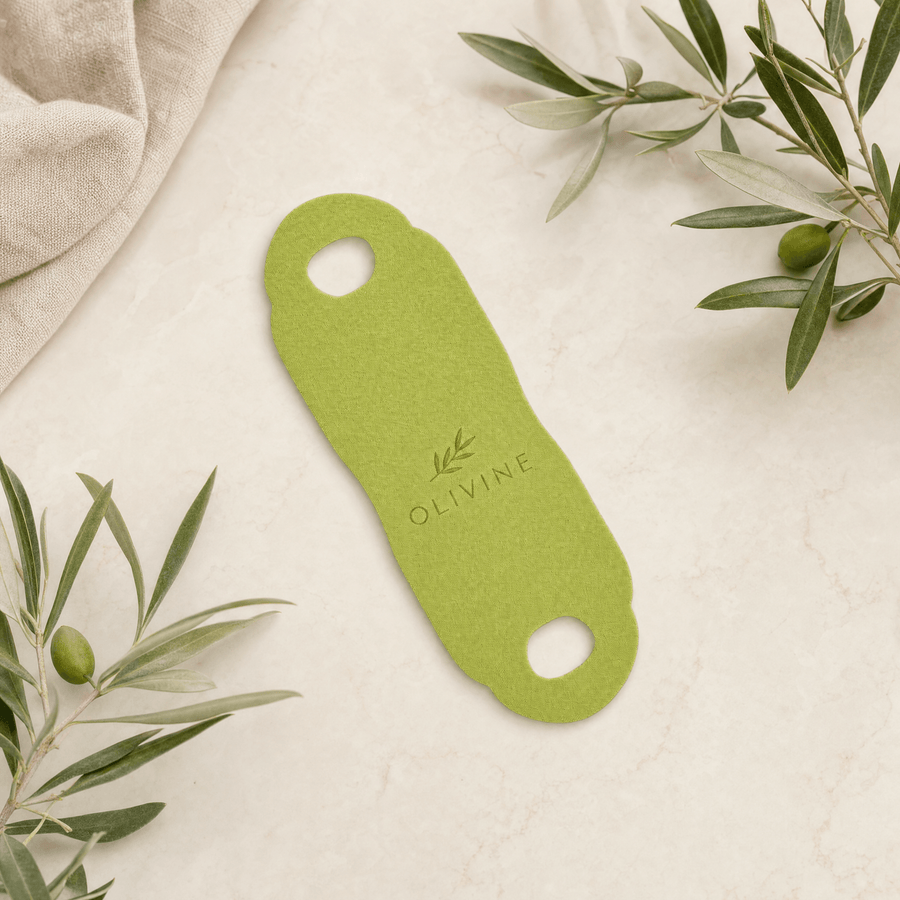 Olivine Cactox V Lifting Mewing Band flat lay on a cream background