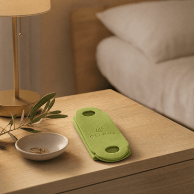 Olivine Cactox V Lifting Mewing Band in a bright bathroom vanity setting