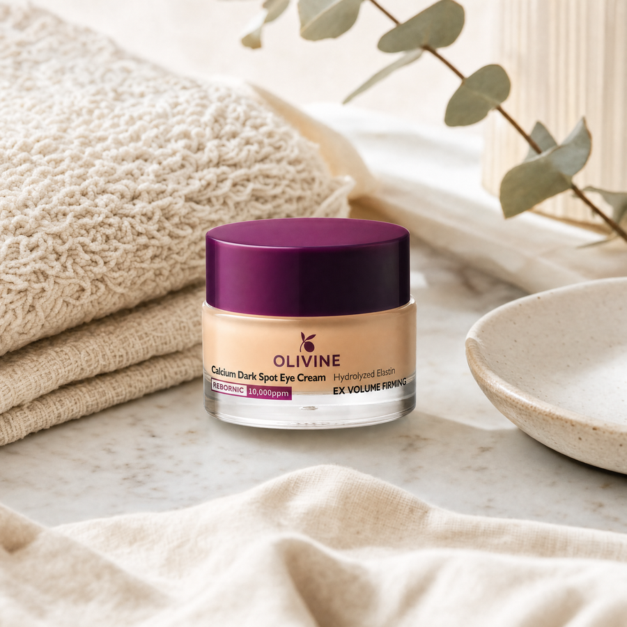 Olivine Calcium Dark Spot Eye Cream on a bright bathroom vanity