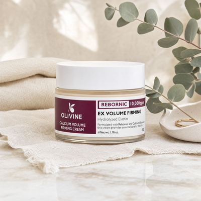 Olivine Calcium Volume Firming Cream on a marble vanity