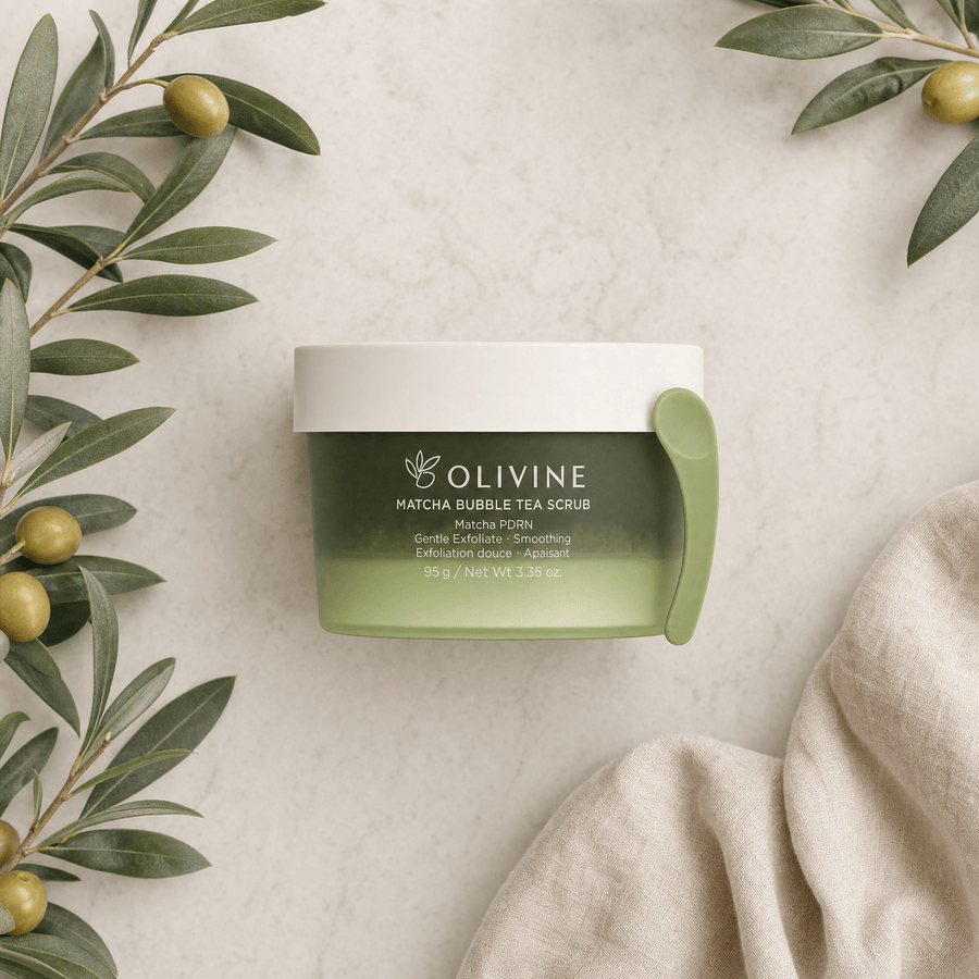 Olivine Matcha PDRN Bubble Tea Scrub flat lay on a cream background