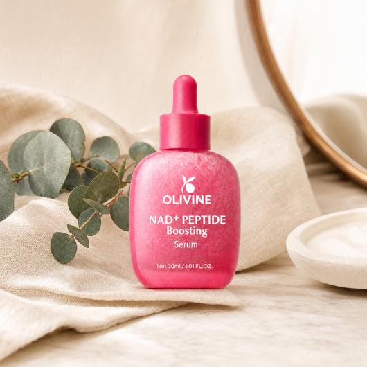 Olivine NAD Plus Peptide Serum on a bright bathroom vanity
