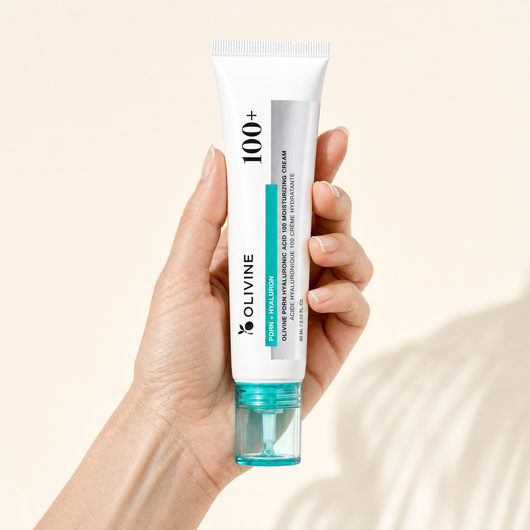 Olivine PDRN Hyaluronic Acid Cream held in hand, close up