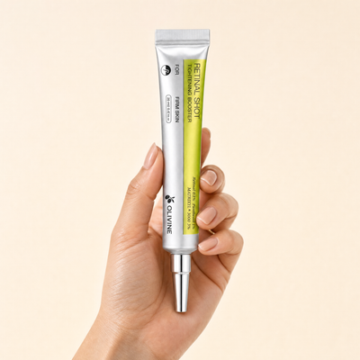 Olivine Vita A Retinal Shot Tightening Booster held in hand, close up