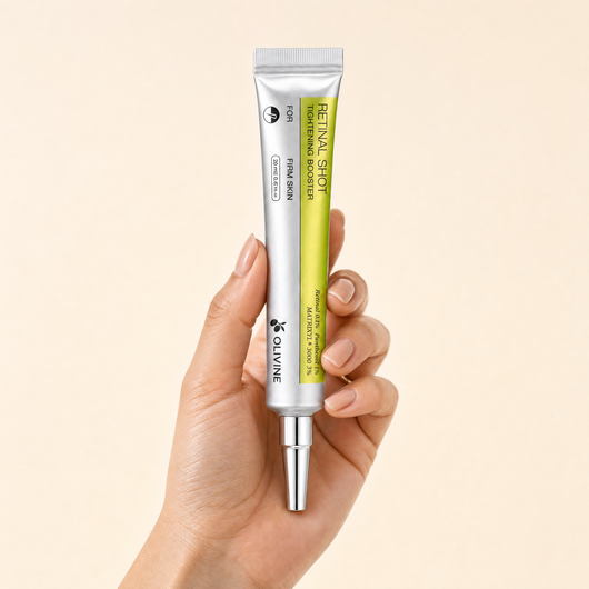 Olivine Vita A Retinal Shot Tightening Booster held in hand, close up
