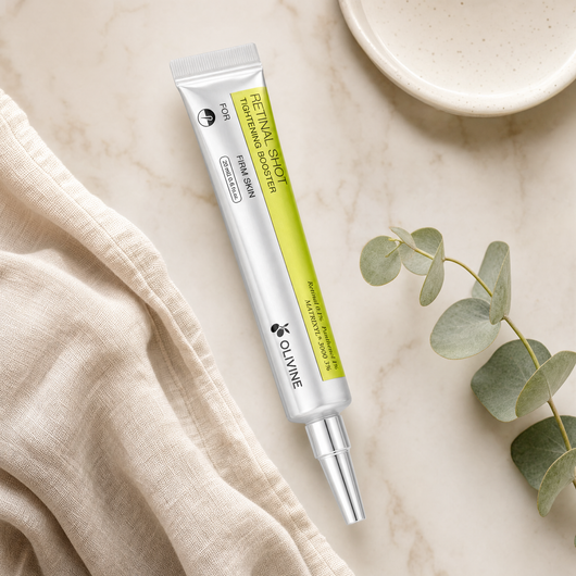 Olivine Vita A Retinal Shot Tightening Booster on a bright bathroom vanity