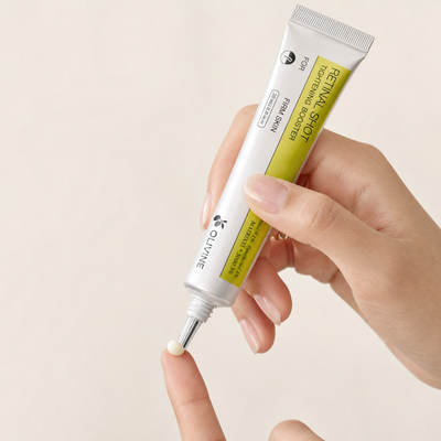 Olivine Vita A Retinal Shot Tightening Booster being squeezed, close up